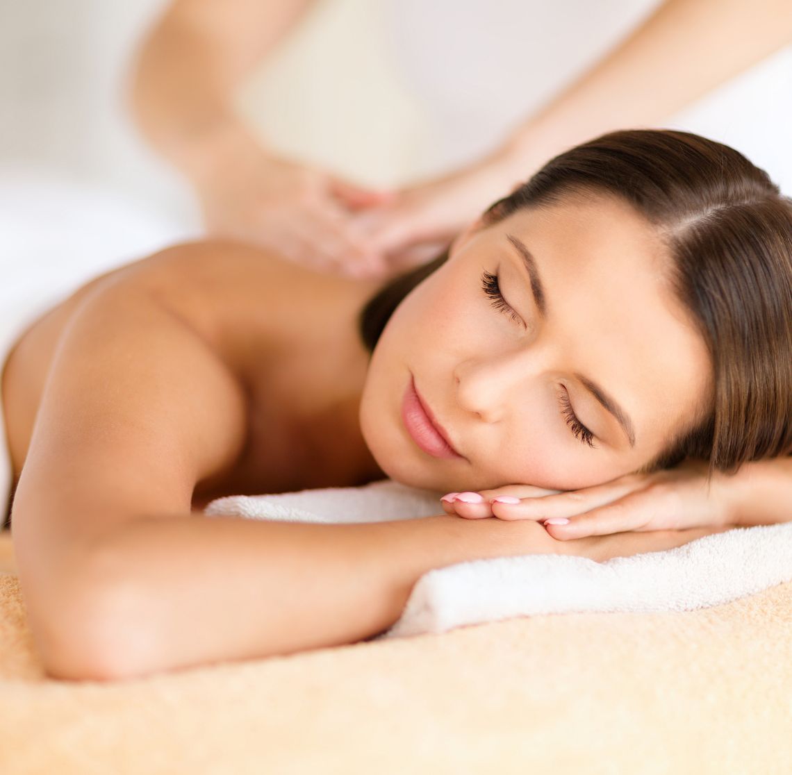 A guest enjoying their 60 MIN on-site relaxing massage